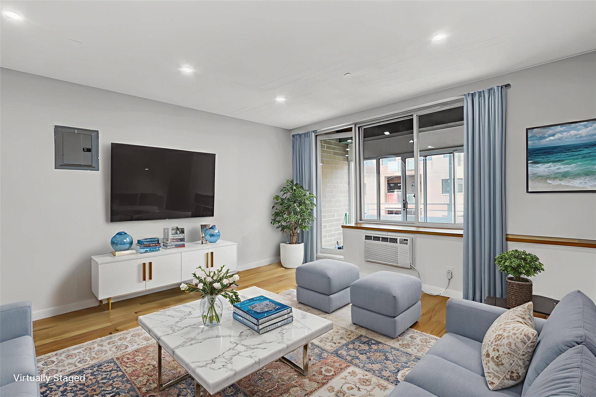 43-17 Union Street, Unit 5A Queens, NY 11355 - Photo 5 of 19 Living room with electric panel, recessed lighting, and wood finished floors