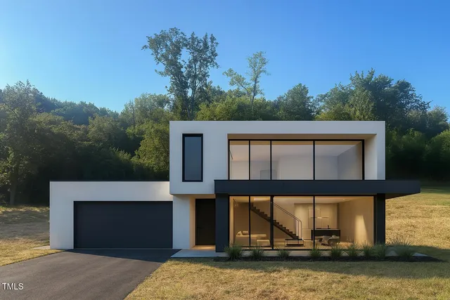 a view of a white house with a outdoor space