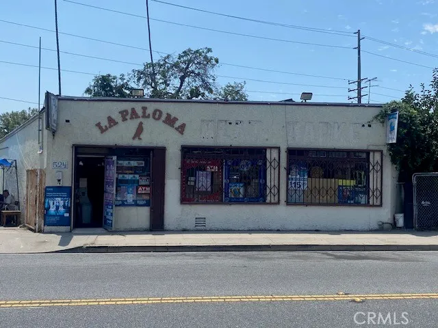 a view of a building with a street