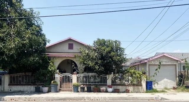a kitchen with a stove sink and cabinets