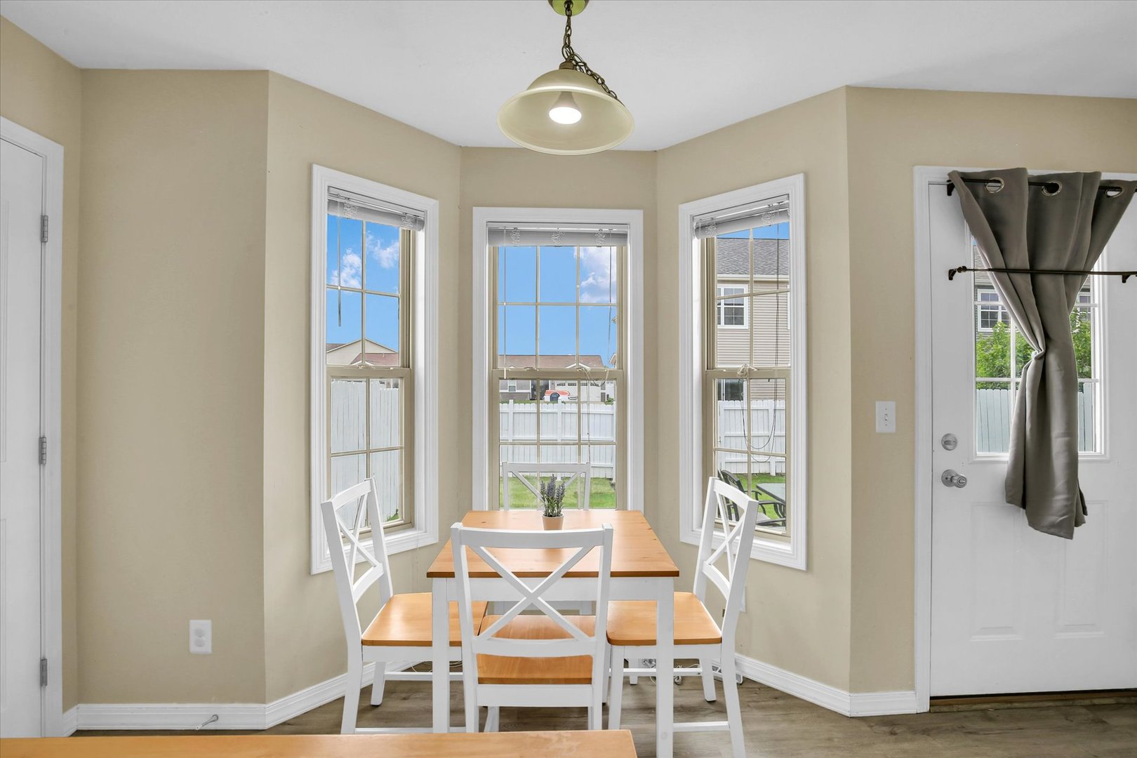 3715 Boulder Ridge Drive Champaign, IL 61822 - Photo 13 of 29 a view of a dining room with furniture and a window