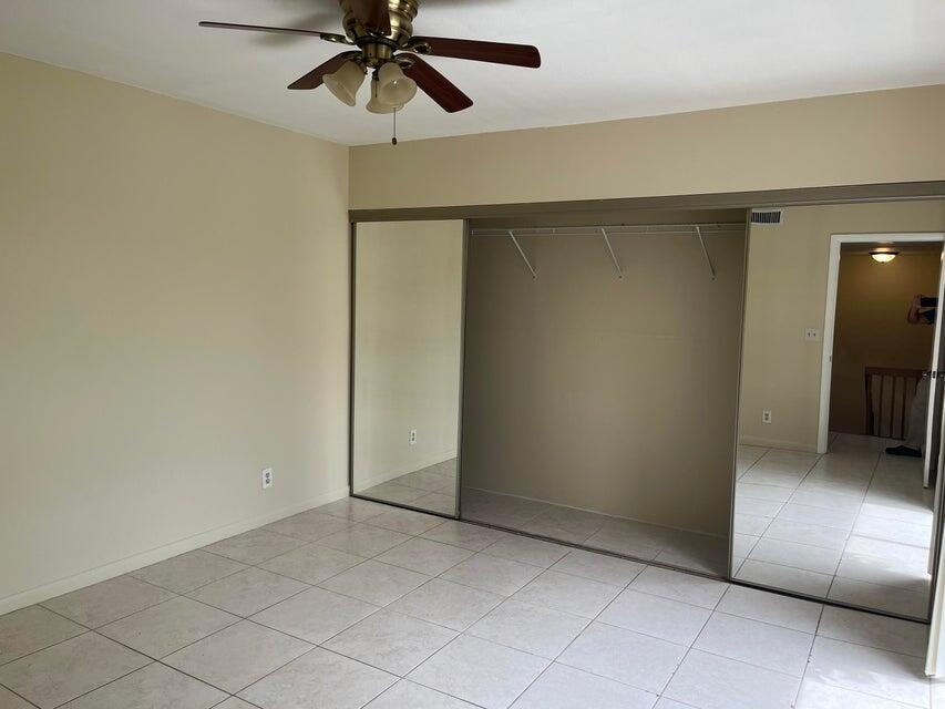 4803 Waterview Circle Palm Springs, FL 33461 - Photo 15 of 22 an empty room with a space