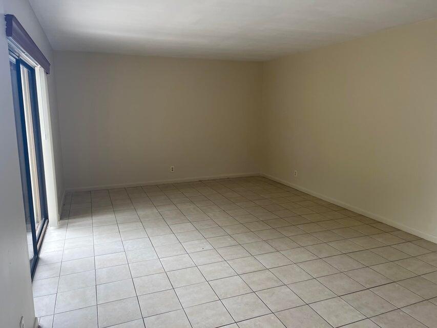 4803 Waterview Circle Palm Springs, FL 33461 - Photo 3 of 22 a view of room and window