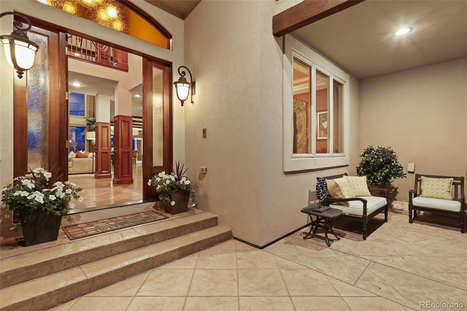 1260 Buffalo Ridge Road Castle Pines, CO 80108 - Photo 2 of 38