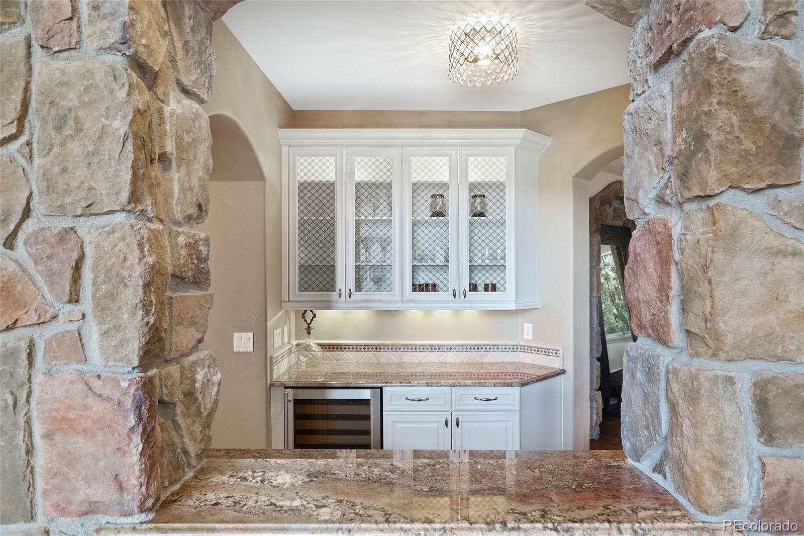 1260 Buffalo Ridge Road Castle Pines, CO 80108 - Photo 7 of 38