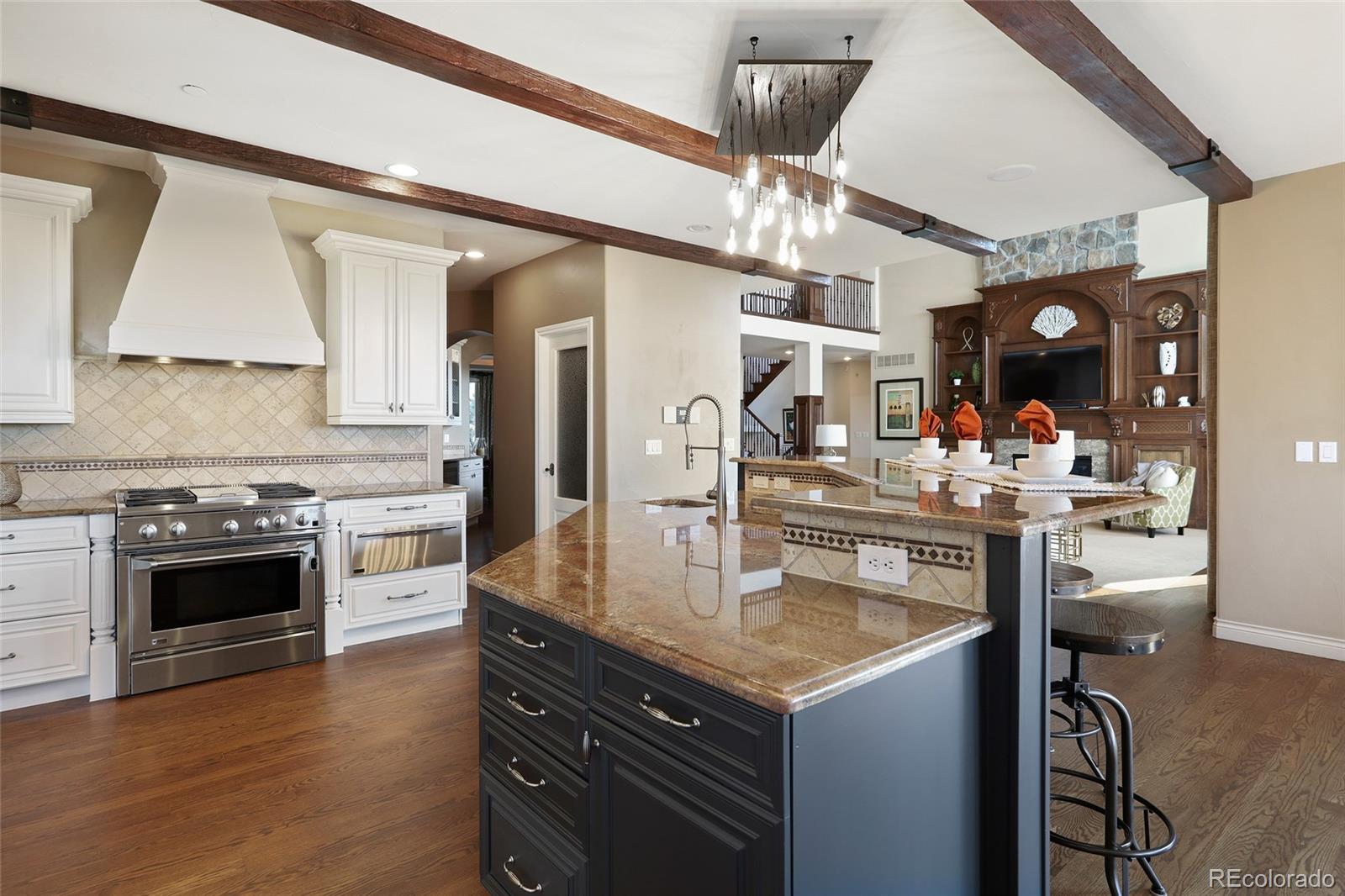 1260 Buffalo Ridge Road Castle Pines, CO 80108 - Photo 9 of 38