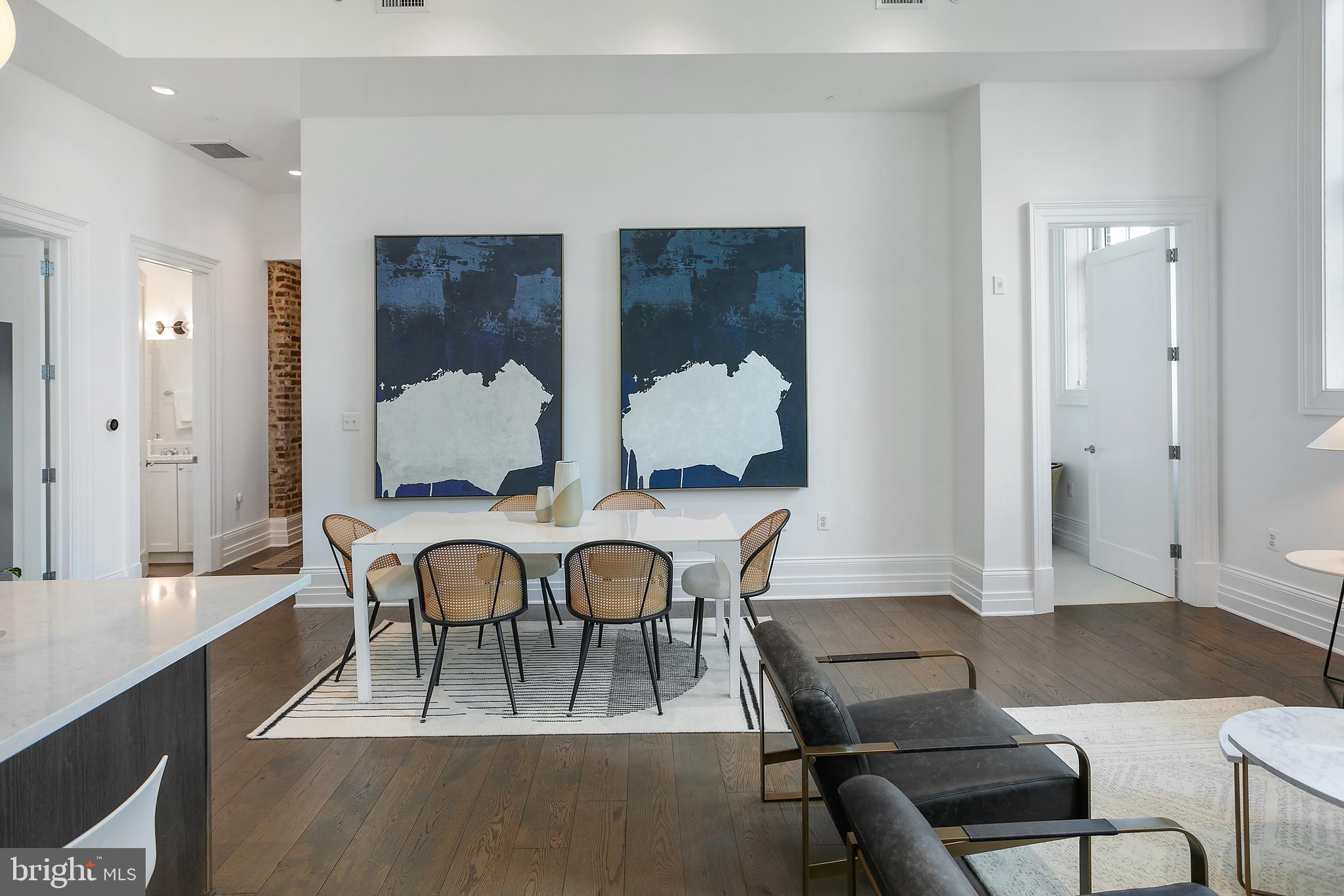 901 D Street Northeast, Unit 102 Washington, DC 20002 - Photo 14 of 40 a dining room with furniture and window