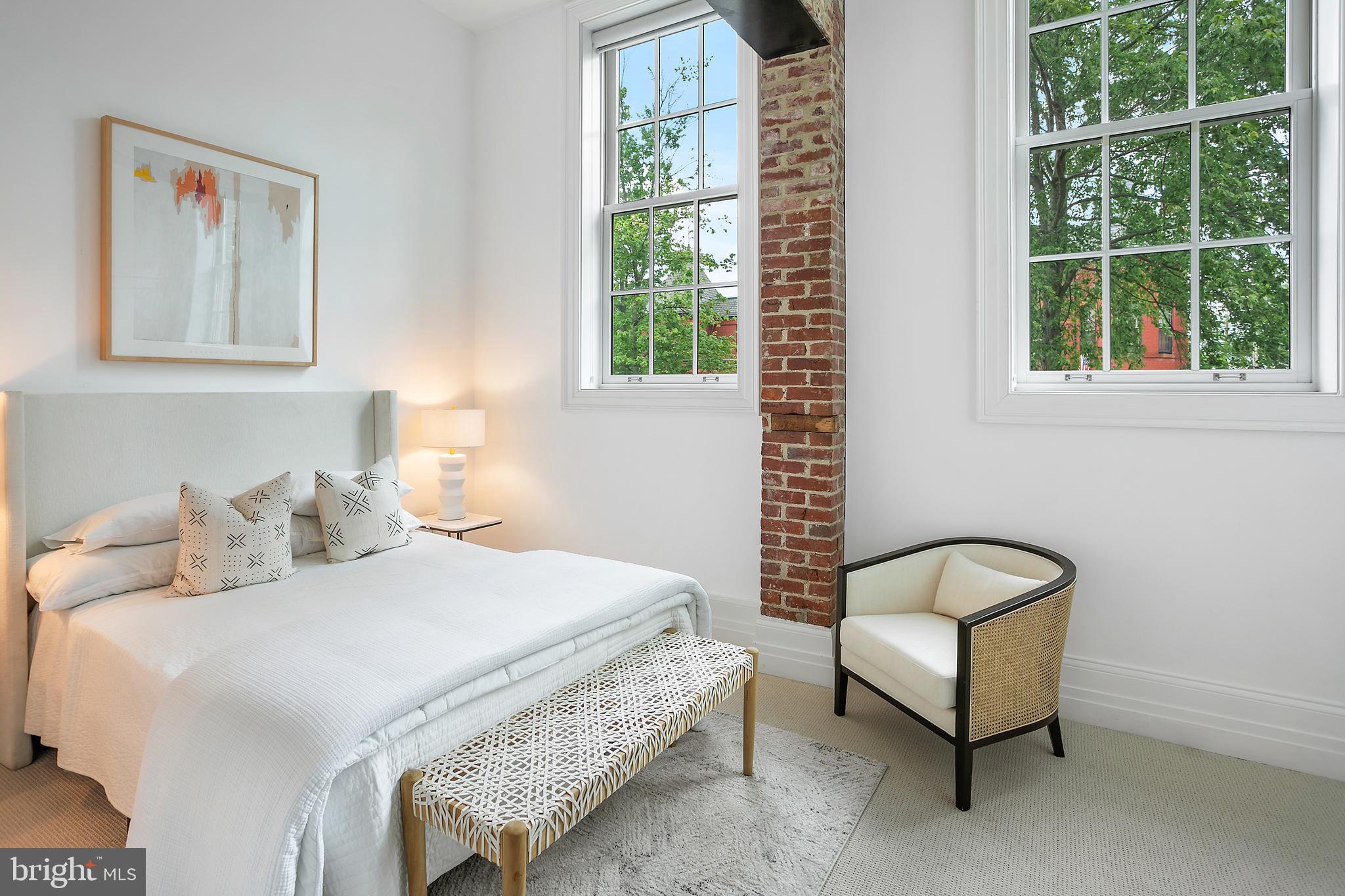 901 D Street Northeast, Unit 102 Washington, DC 20002 - Photo 15 of 40 a bedroom with a bed and a window