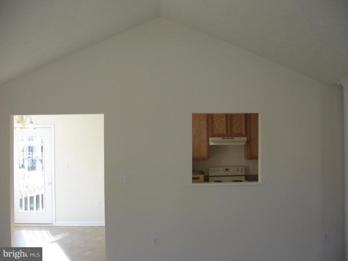 112 Azalea Road, Unit 250 Colonial Beach, VA 22443 - Photo 3 of 27 Vaulted Ceilings and a convienent pass thru