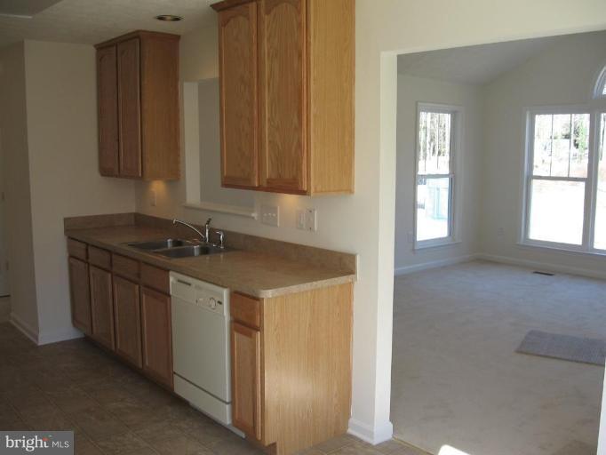 112 Azalea Road, Unit 250 Colonial Beach, VA 22443 - Photo 8 of 27 STANDING IN BREAKFAST ROOM
