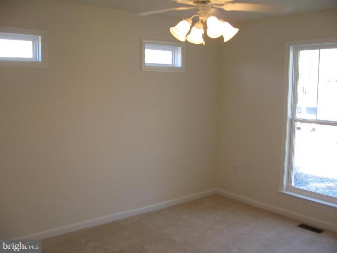 112 Azalea Road, Unit 250 Colonial Beach, VA 22443 - Photo 9 of 27 LARGE MASTER BEDROOM