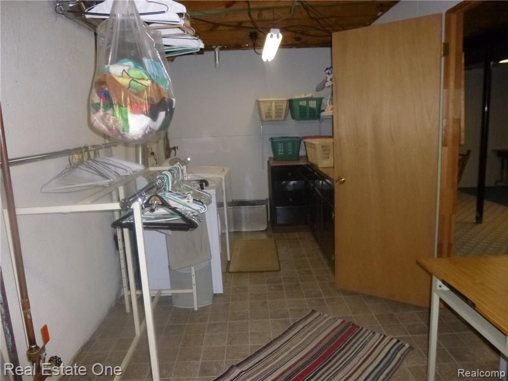 4345 Old Mill Road Pinckney, MI 48169 - Photo 34 of 39 Nice sized laundry room