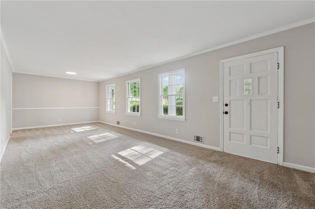 4616 Greensprings Road Atlanta, GA 30337 - Photo 2 of 26 a view of empty room with window