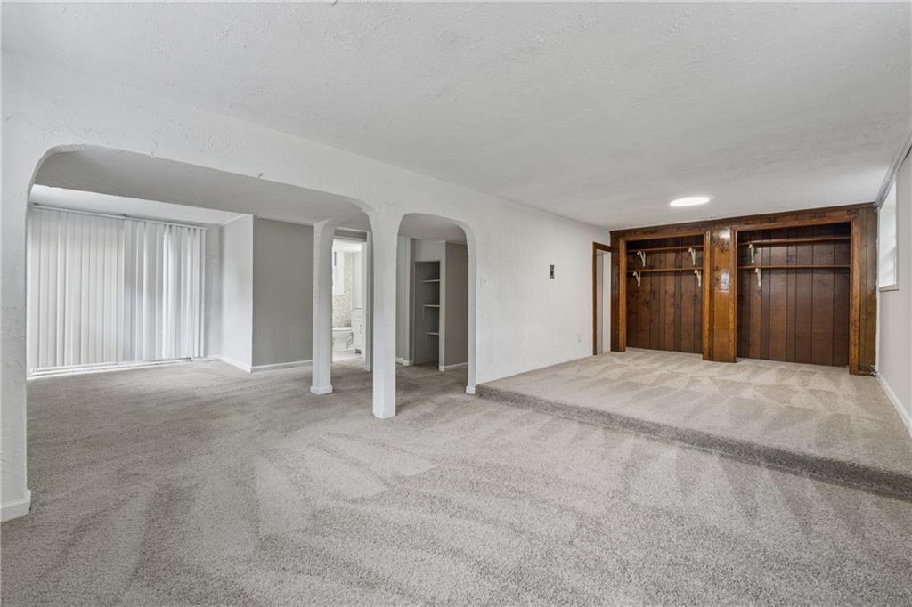 4616 Greensprings Road Atlanta, GA 30337 - Photo 21 of 26 a view of an empty room with closet and bathroom