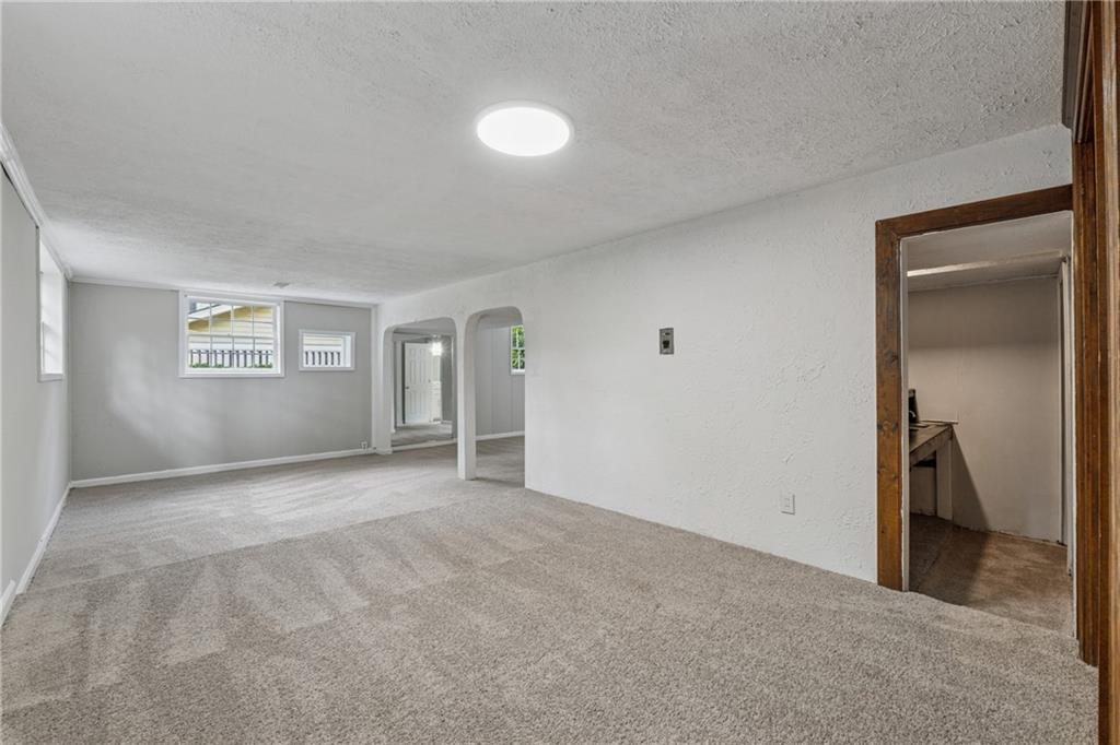 4616 Greensprings Road Atlanta, GA 30337 - Photo 22 of 26 a view of an empty room with a window