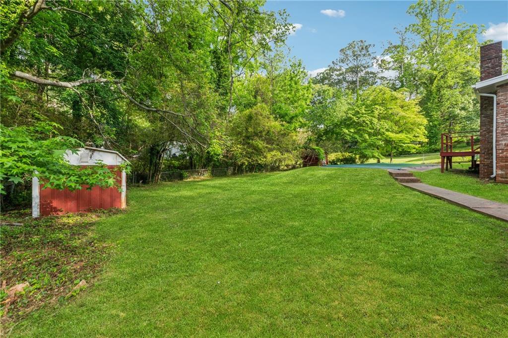 4616 Greensprings Road Atlanta, GA 30337 - Photo 23 of 26 a view of a trees with a yard