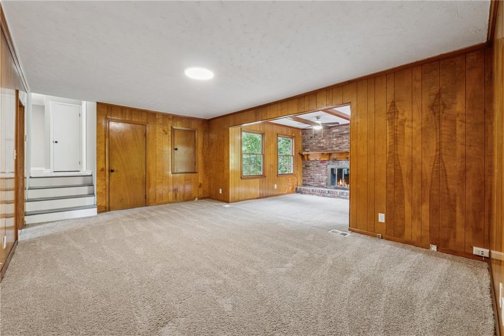 4616 Greensprings Road Atlanta, GA 30337 - Photo 5 of 26 a view of an empty room with a window