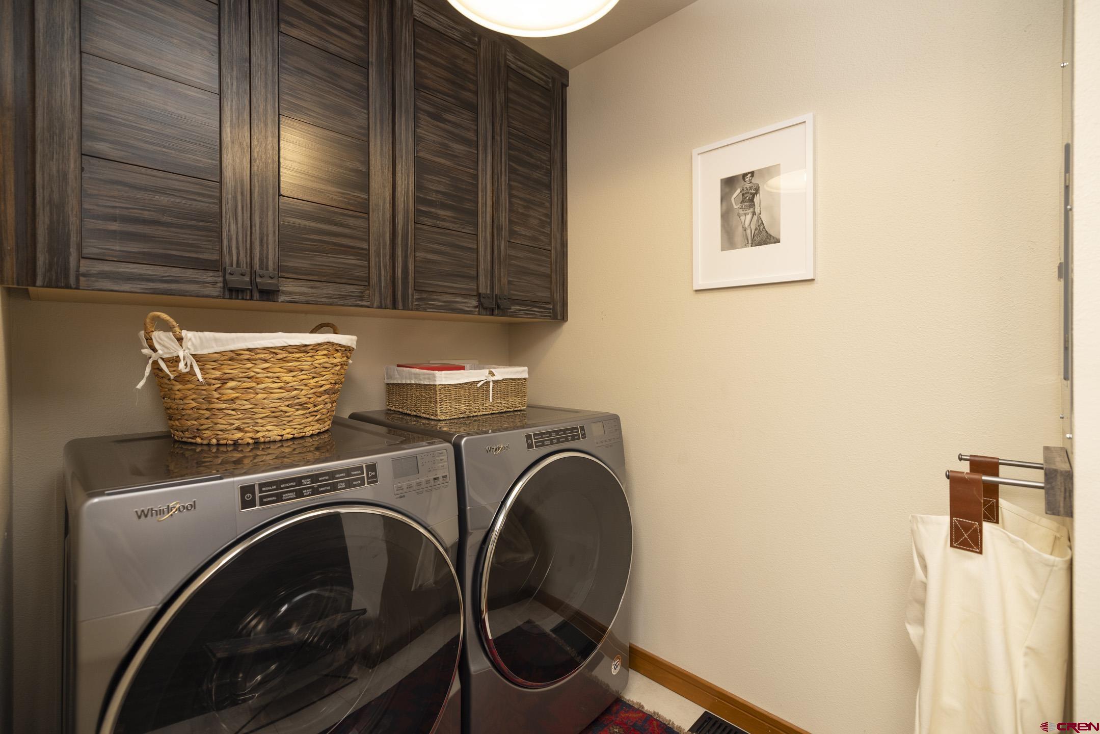 154 Falcon Ridge Road Durango, CO 81301 - Photo 34 of 42 a utility room with dryer and washer