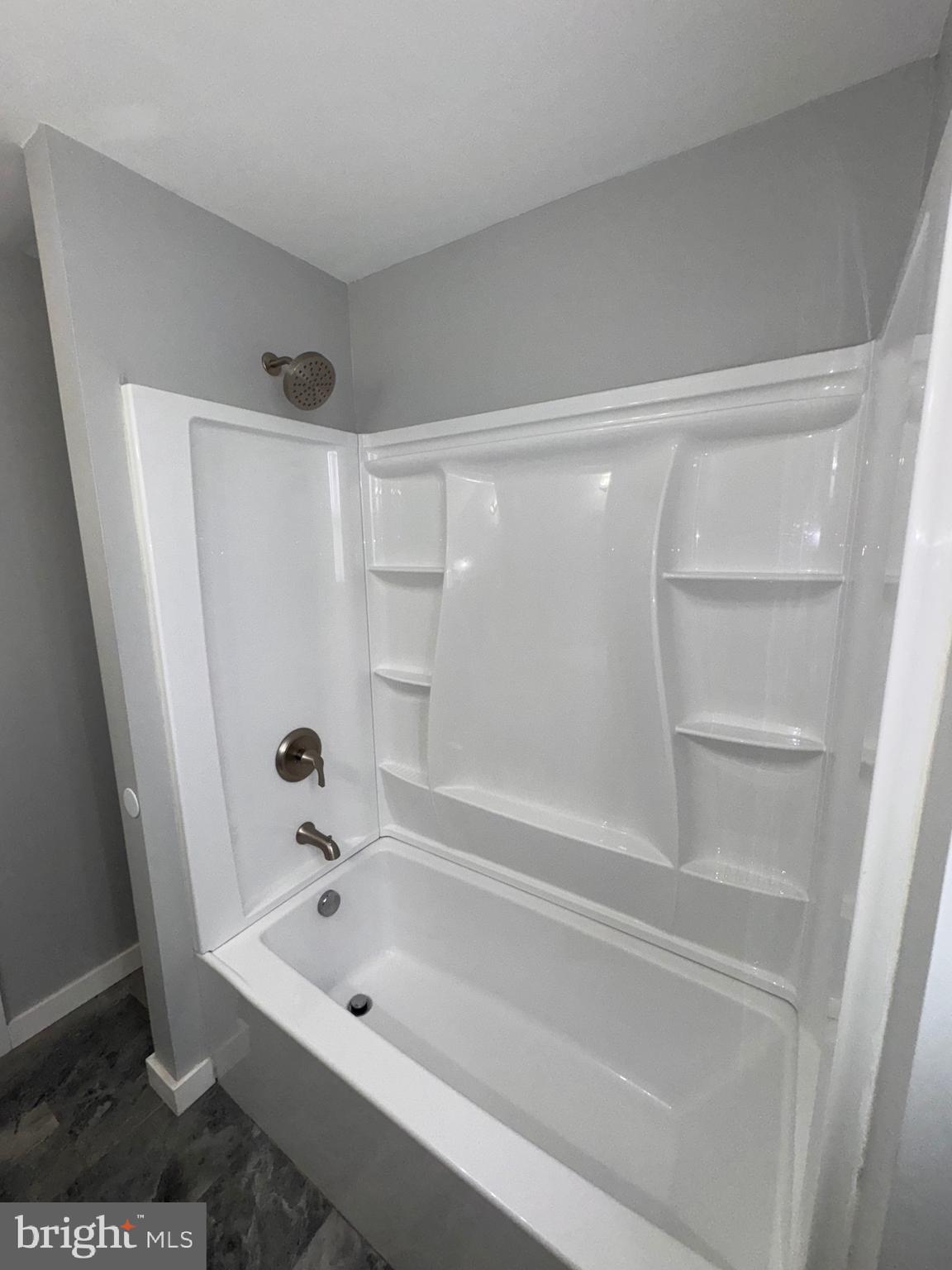 2896 Cushing Road Camden, NJ 08104 - Photo 22 of 31 a bathroom with a bathtub and a shower