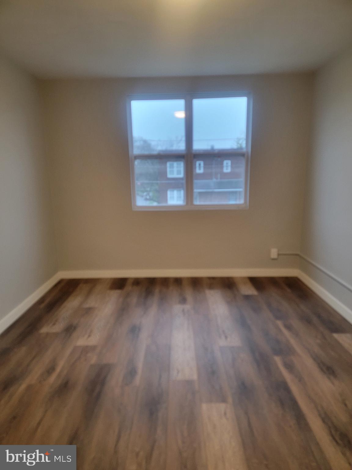 2896 Cushing Road Camden, NJ 08104 - Photo 26 of 31 a view of a room that has wooden floor and cabinets