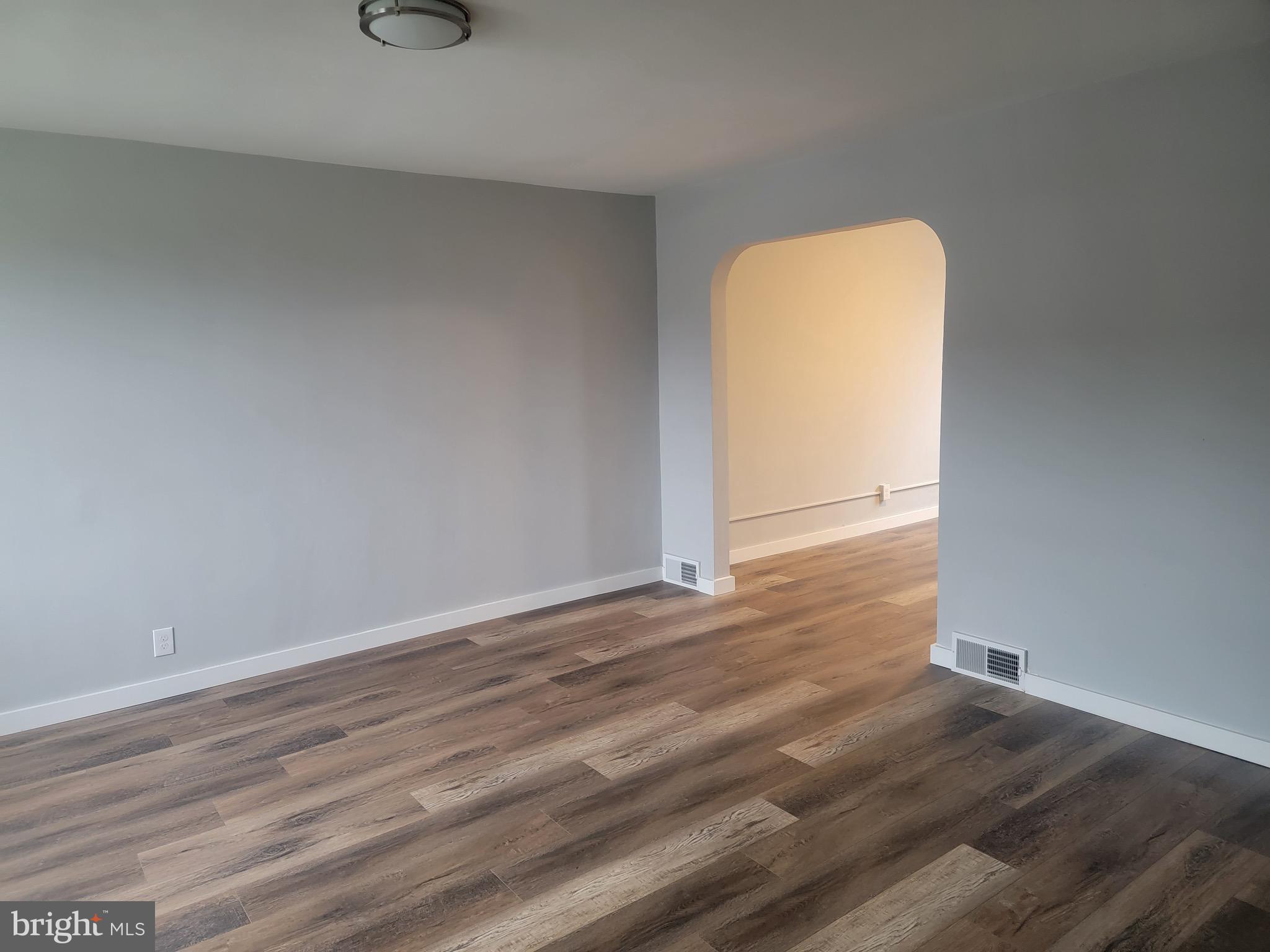 2896 Cushing Road Camden, NJ 08104 - Photo 10 of 31 a view of a room with wooden floor
