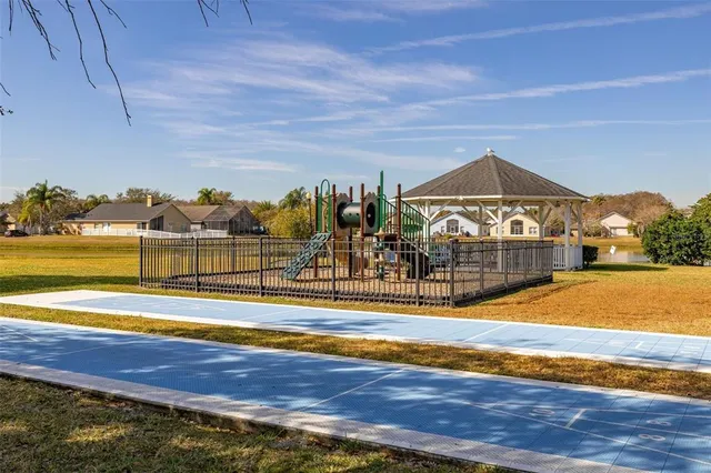 a view of a park with a slide