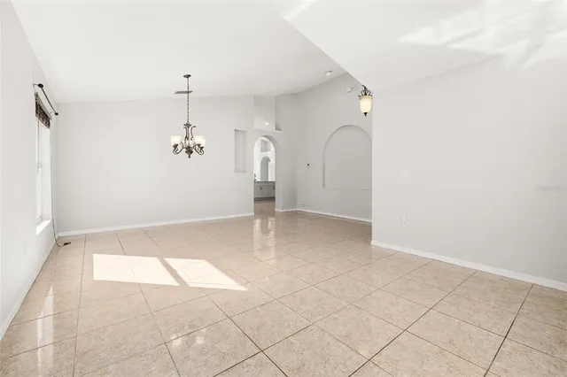 a kitchen with stainless steel appliances a stove refrigerator sink and cabinets