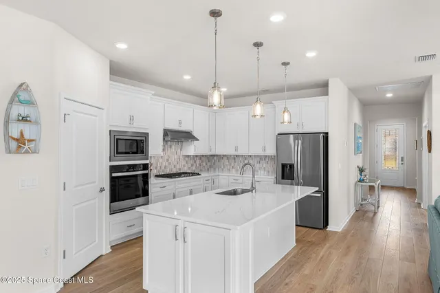 $739,982 | 8870 Shoreline Avenue, Melbourne, FL 32940