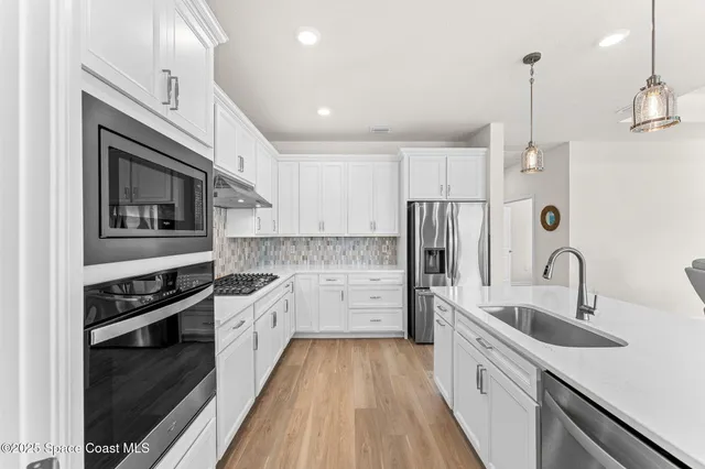 $739,982 | 8870 Shoreline Avenue, Melbourne, FL 32940