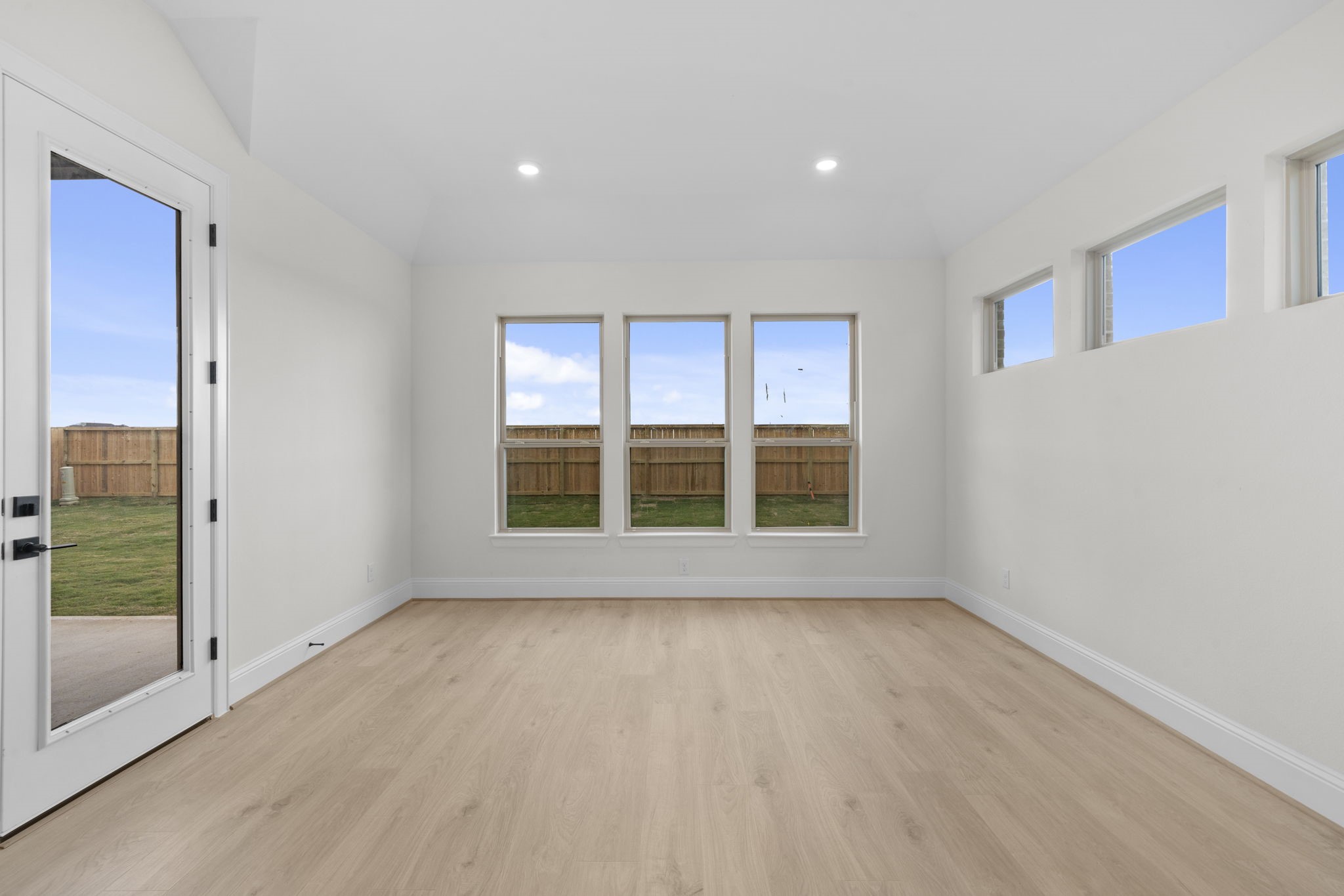 648 Cross Timbers Trace Hempstead, TX 77445 - Photo 27 of 40 a view of room with window and hardwood floor