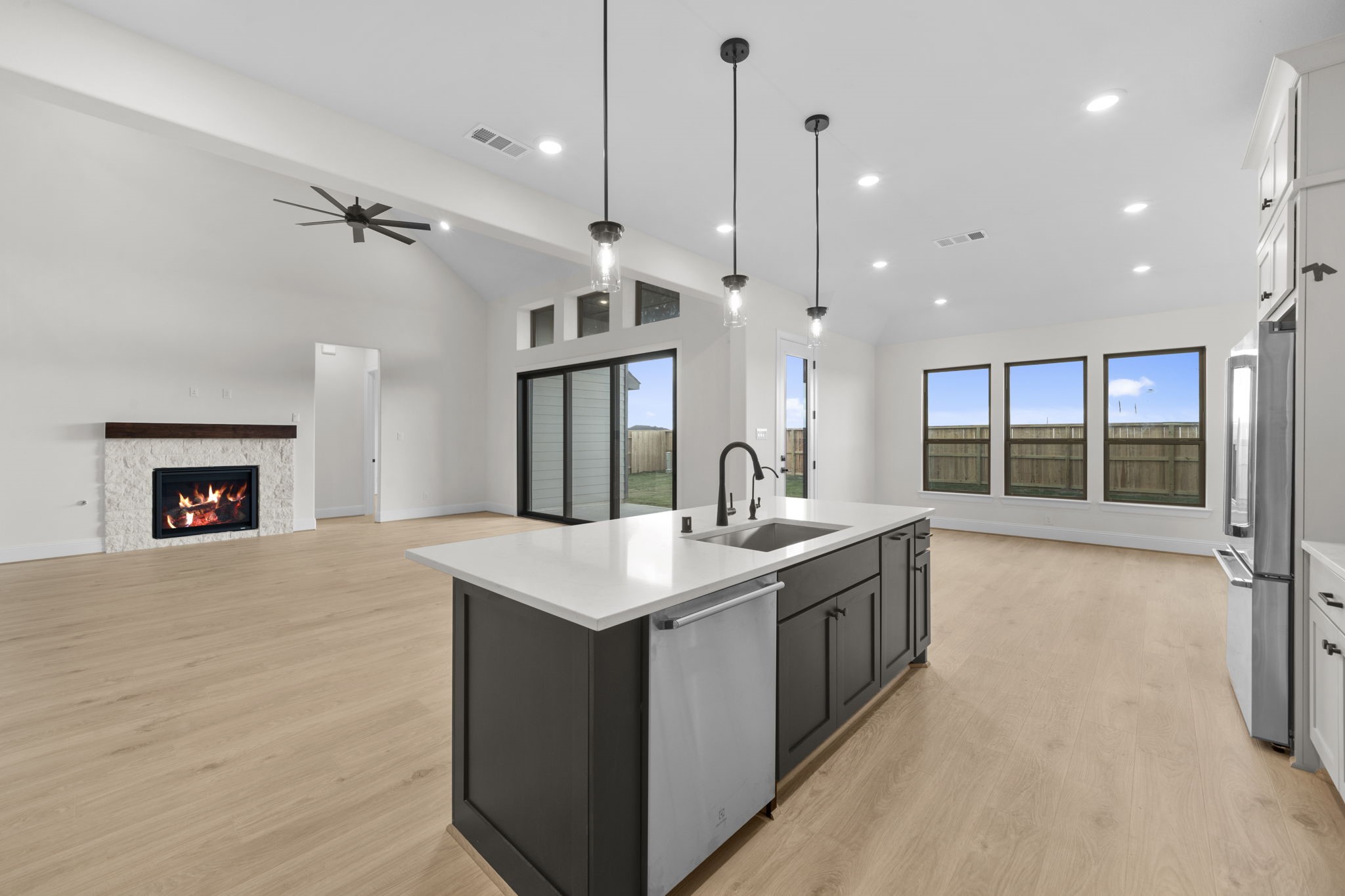 648 Cross Timbers Trace Hempstead, TX 77445 - Photo 7 of 40 a large kitchen with stainless steel appliances granite countertop a sink and a refrigerator