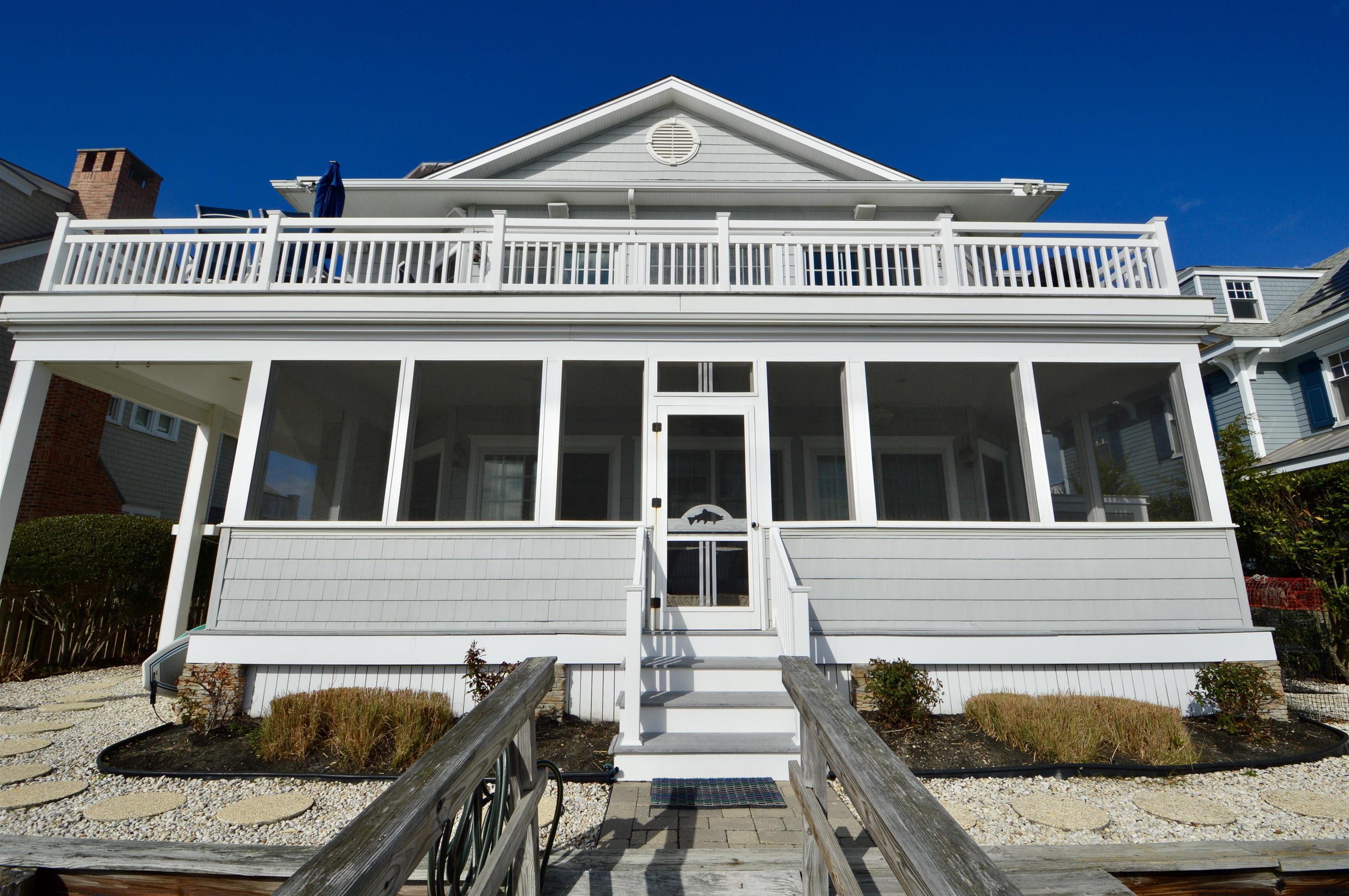 4765 4th Avalon, NJ 08202 - Photo 13 of 41 front view of a house with a porch