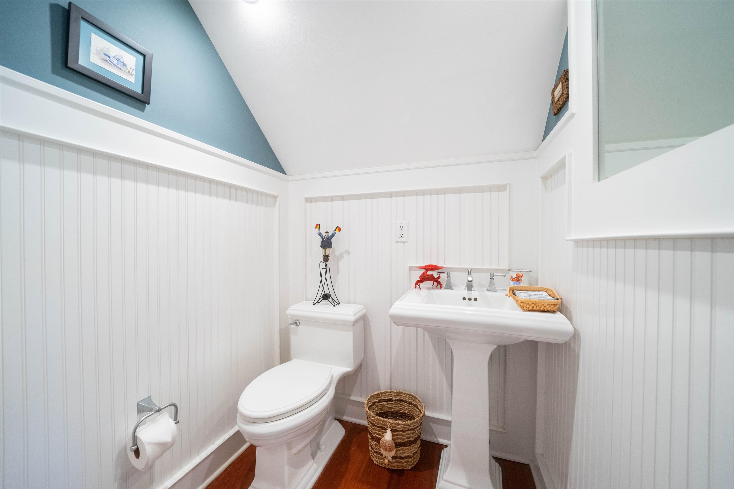 4765 4th Avalon, NJ 08202 - Photo 14 of 41 a bathroom with a sink toilet and a mirror