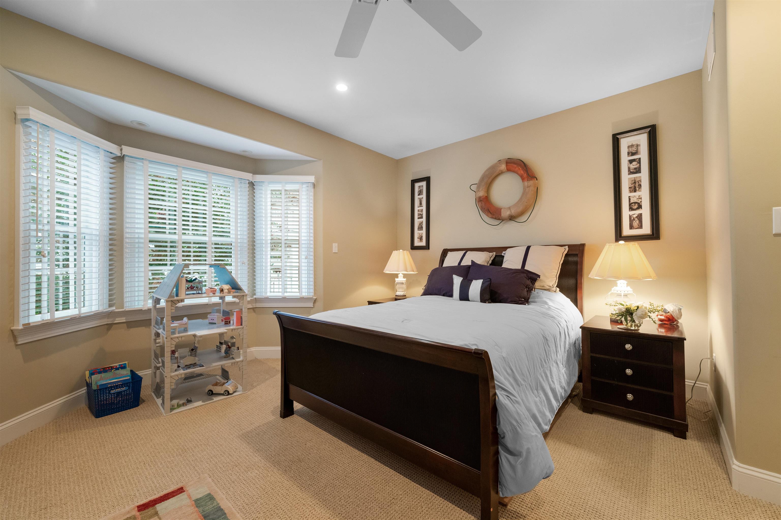 4765 4th Avalon, NJ 08202 - Photo 16 of 41 a bed room with a bed and a chair