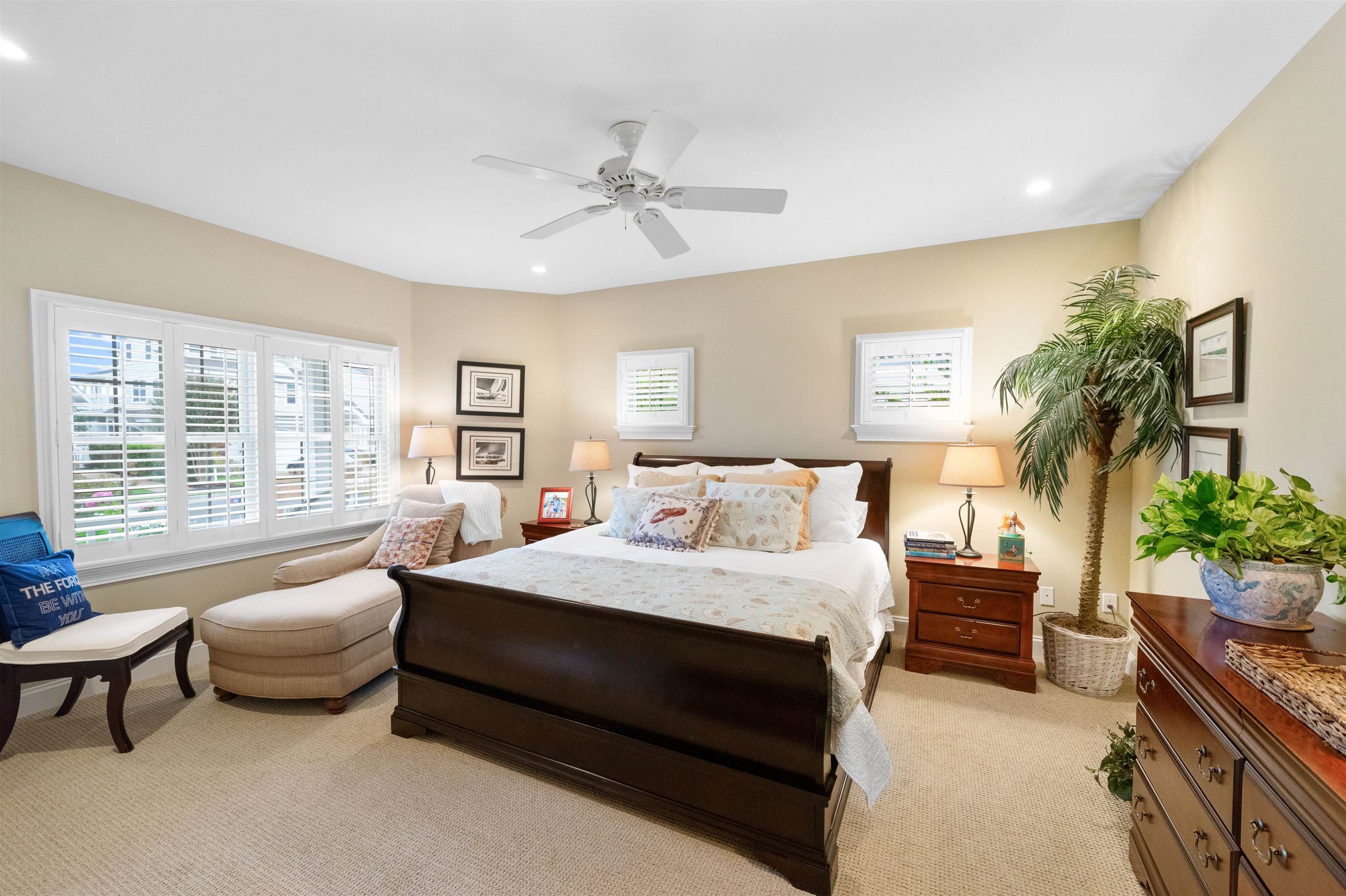 4765 4th Avalon, NJ 08202 - Photo 18 of 41 a bedroom with a balcony a bed and a couch