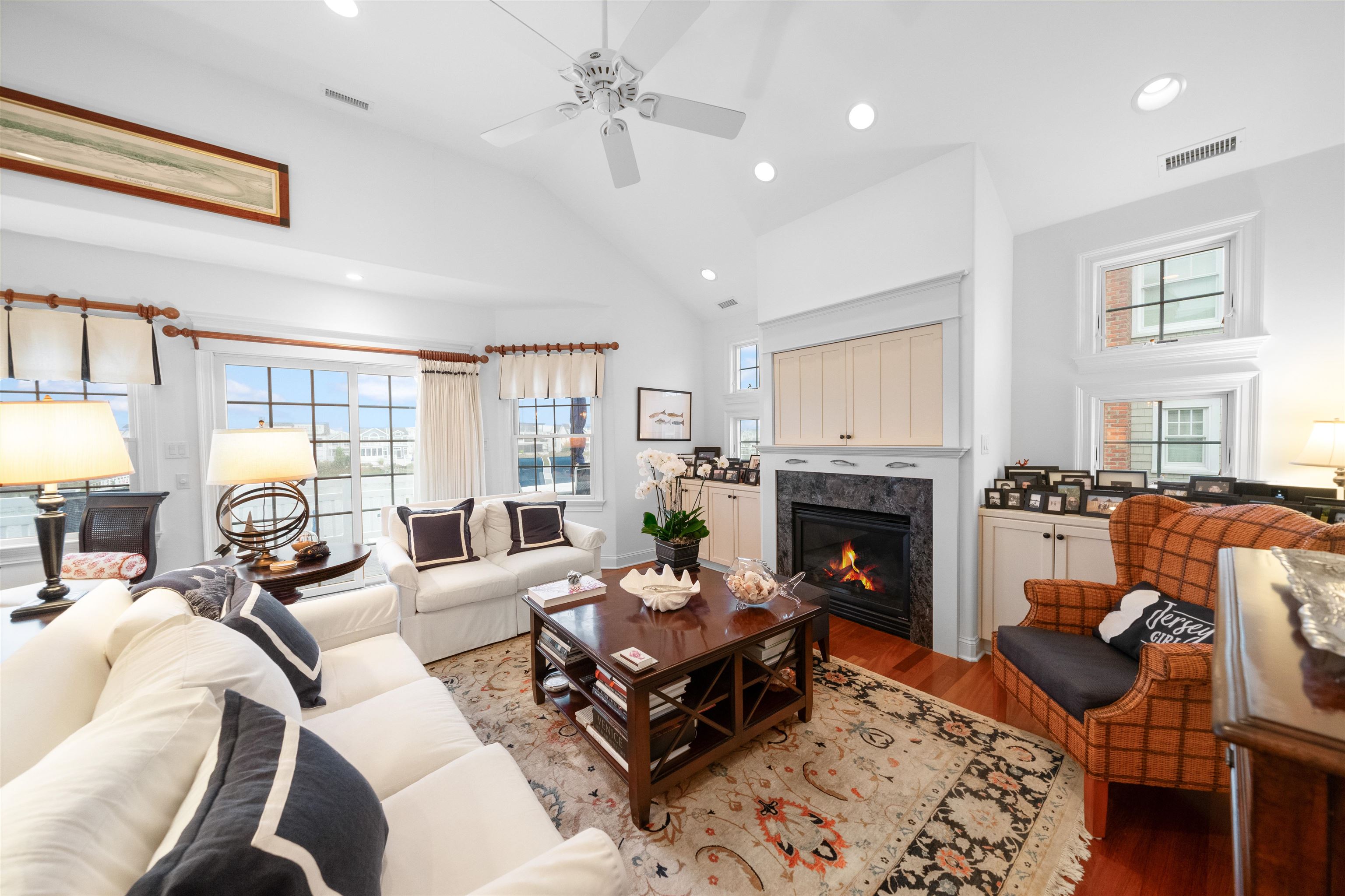 4765 4th Avalon, NJ 08202 - Photo 22 of 41 a living room with furniture fireplace and window