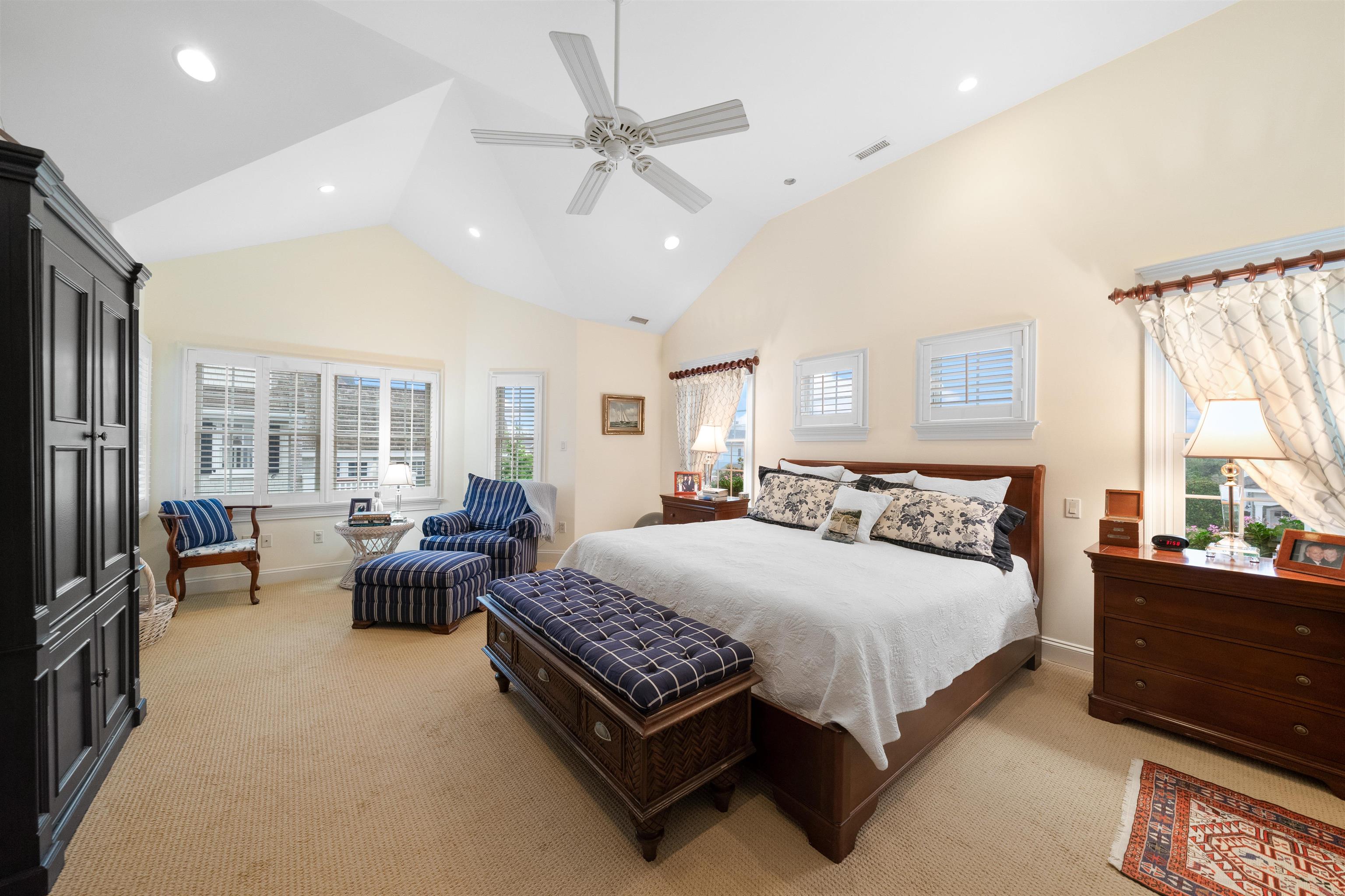 4765 4th Avalon, NJ 08202 - Photo 30 of 41 a bedroom with a bed couch and large window