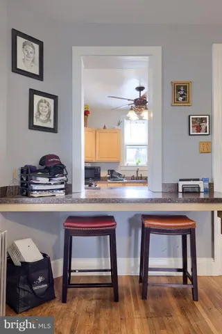 a kitchen with a sink cabinets and window