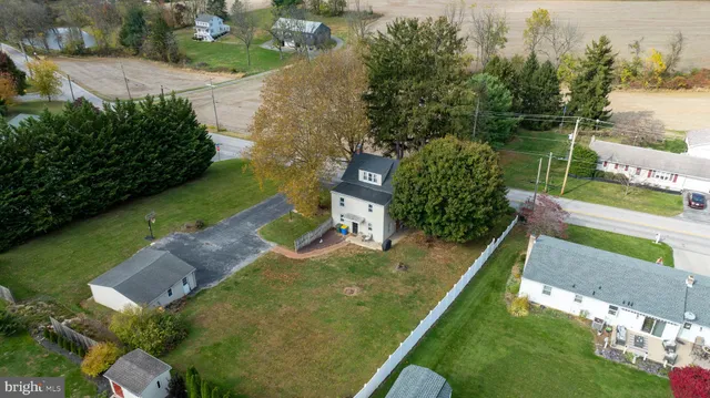 an aerial view of a city with lake view