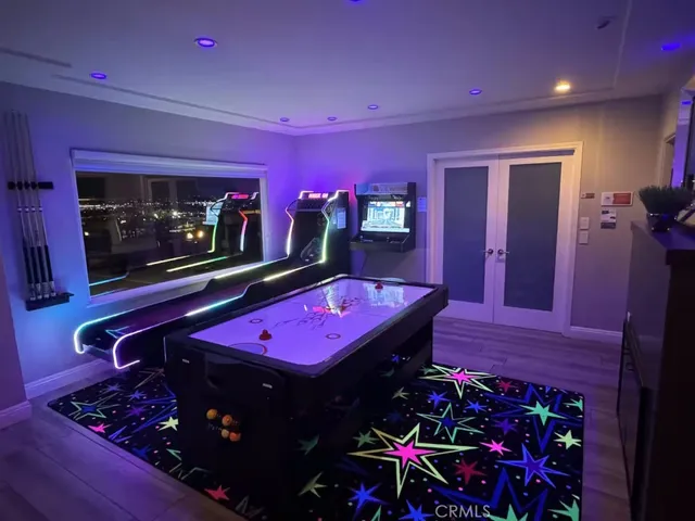 a view of a terrace with couches and city view