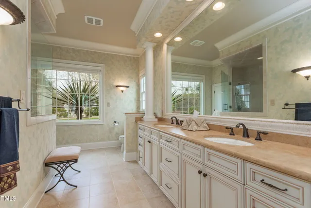 a view of a balcony with wooden floor and floor to ceiling window