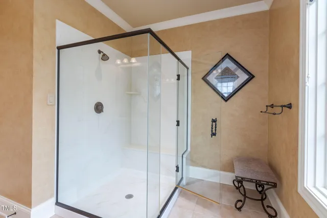 a view of residential houses with yard and lake view