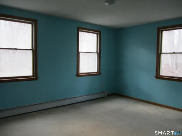 an empty room with windows