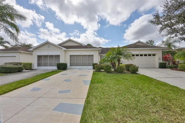 a view of a tennis ground with a large pool