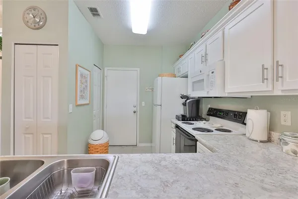 a bedroom with a bed and a table