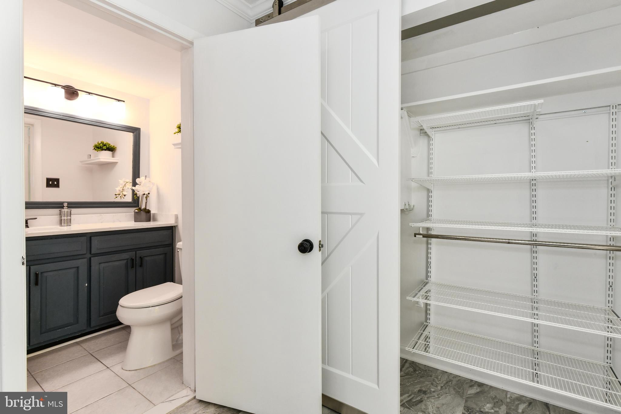 11701 Newbridge Court Reston, VA 20191 - Photo 17 of 64 New barn door, lots of storage and new woodwork