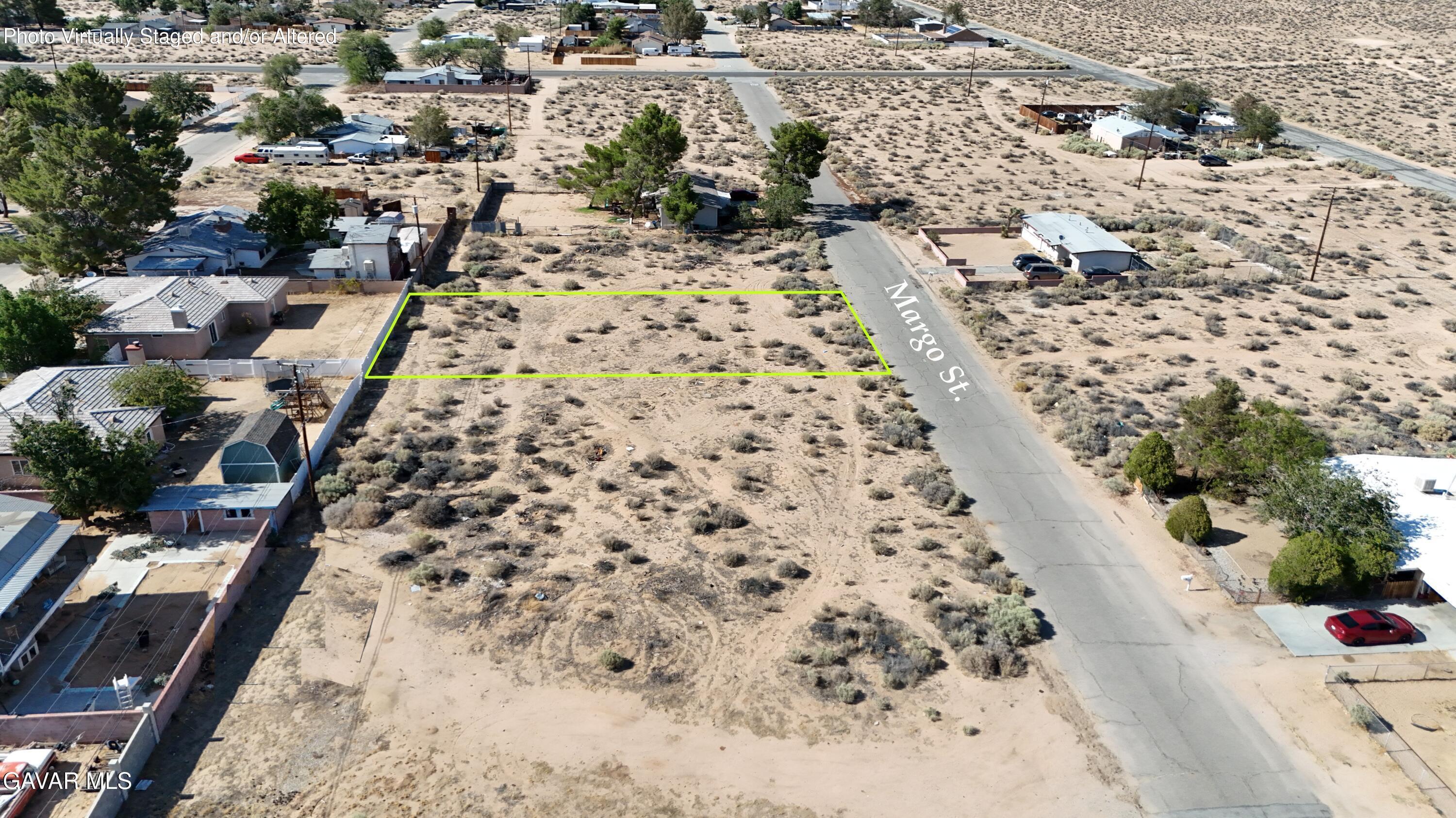 Margo Street Edwards, CA 93524 - Photo 2 of 4 a view of a backyard