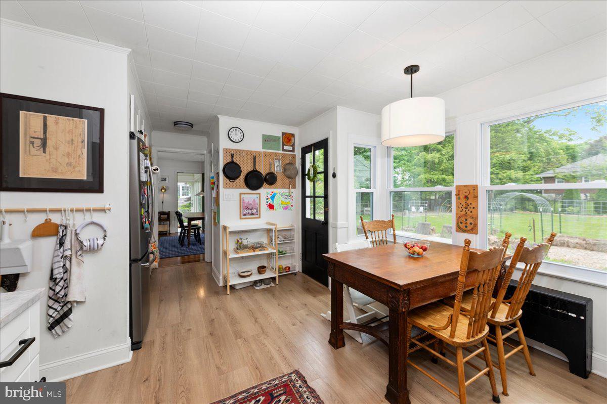1708 Wrightfield Road Yardley, PA 19067 - Photo 15 of 41 a view of a dining room with furniture window and wooden floor