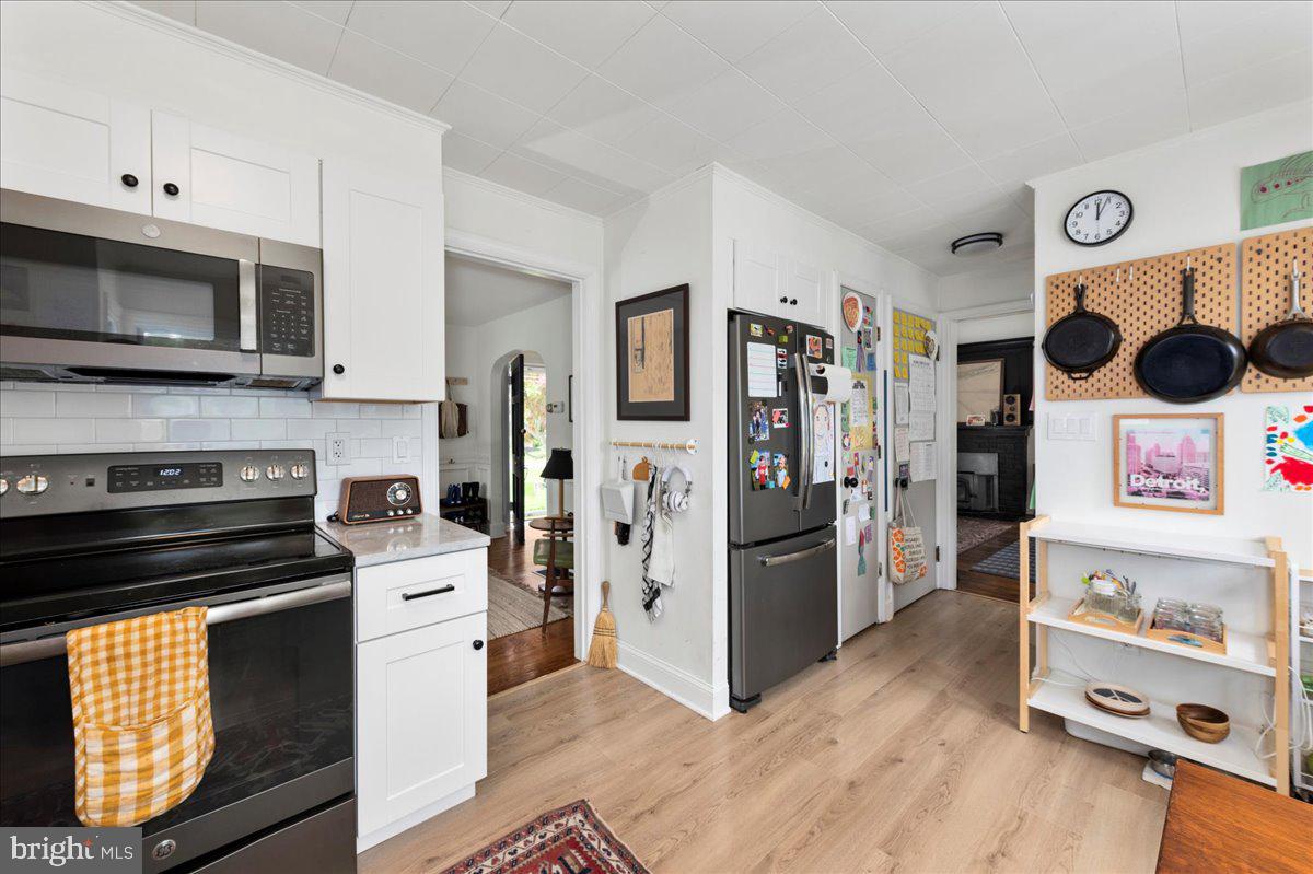 1708 Wrightfield Road Yardley, PA 19067 - Photo 16 of 41 a kitchen with stainless steel appliances a stove microwave and a refrigerator