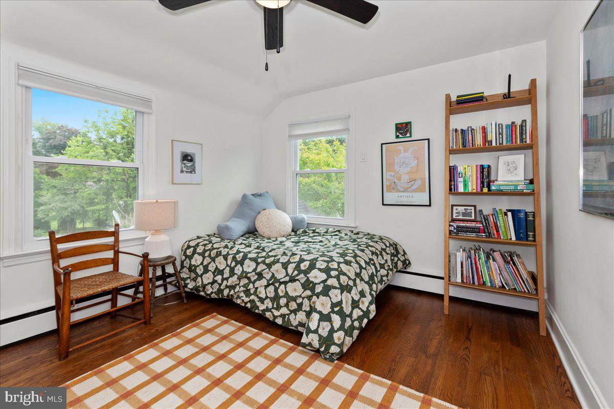 1708 Wrightfield Road Yardley, PA 19067 - Photo 25 of 41 a bedroom with furniture and a book shelf